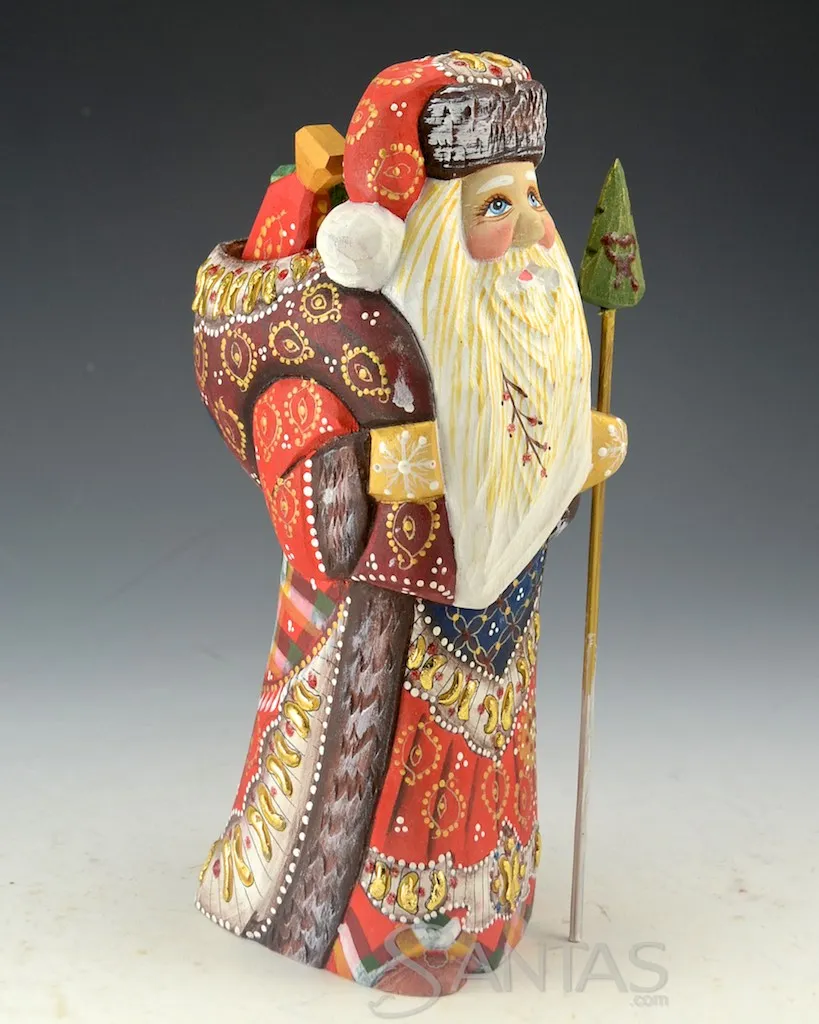 Decorative and Detailed Traveling Carved Santa with Staff and Toy Bag