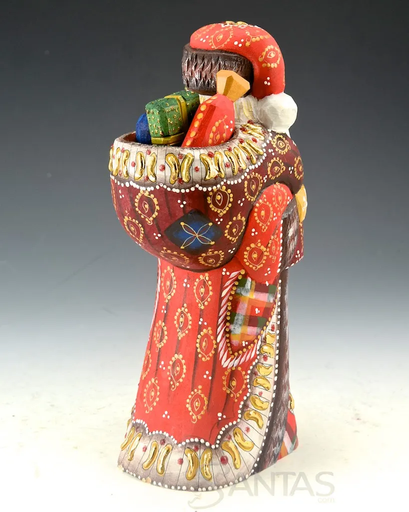 Decorative and Detailed Traveling Carved Santa with Staff and Toy Bag