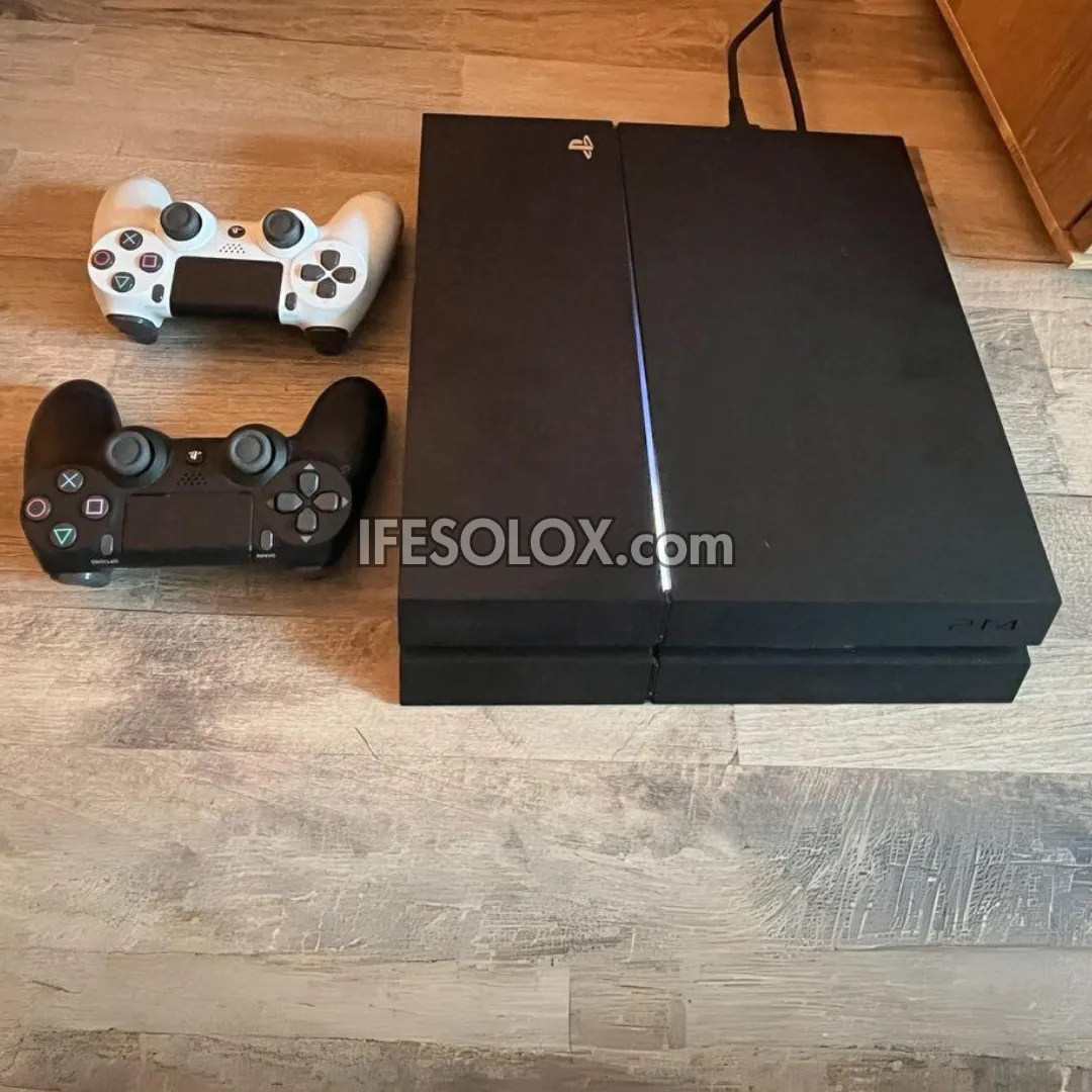 Sony Playstation 4 (PS4) 1TB Game Console with 2 DUALSHOCK 4 Controllers and 10 Games - Foreign Used