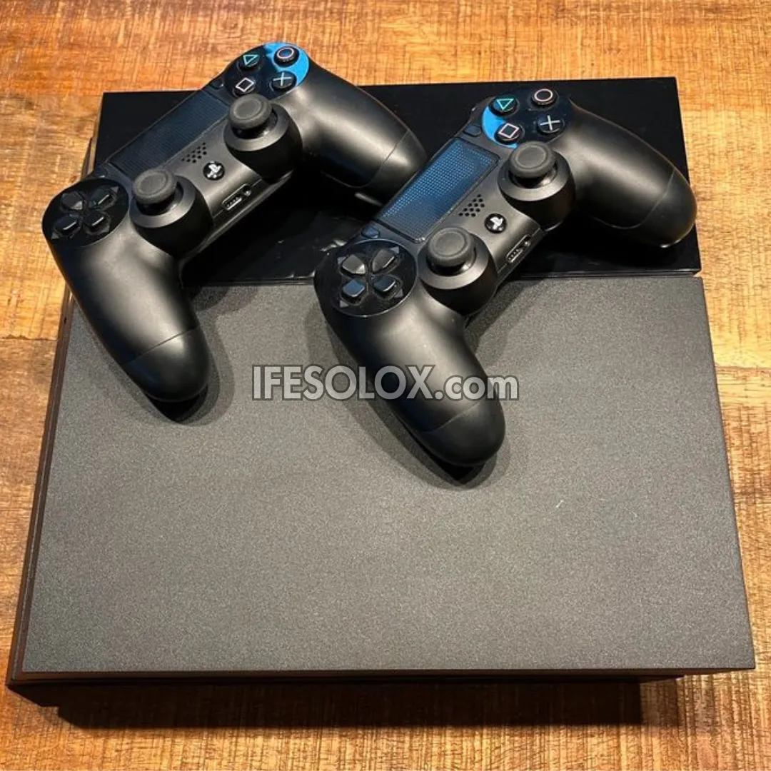 Sony Playstation 4 (PS4) 1TB Game Console with 2 DUALSHOCK 4 Controllers and 10 Games - Foreign Used